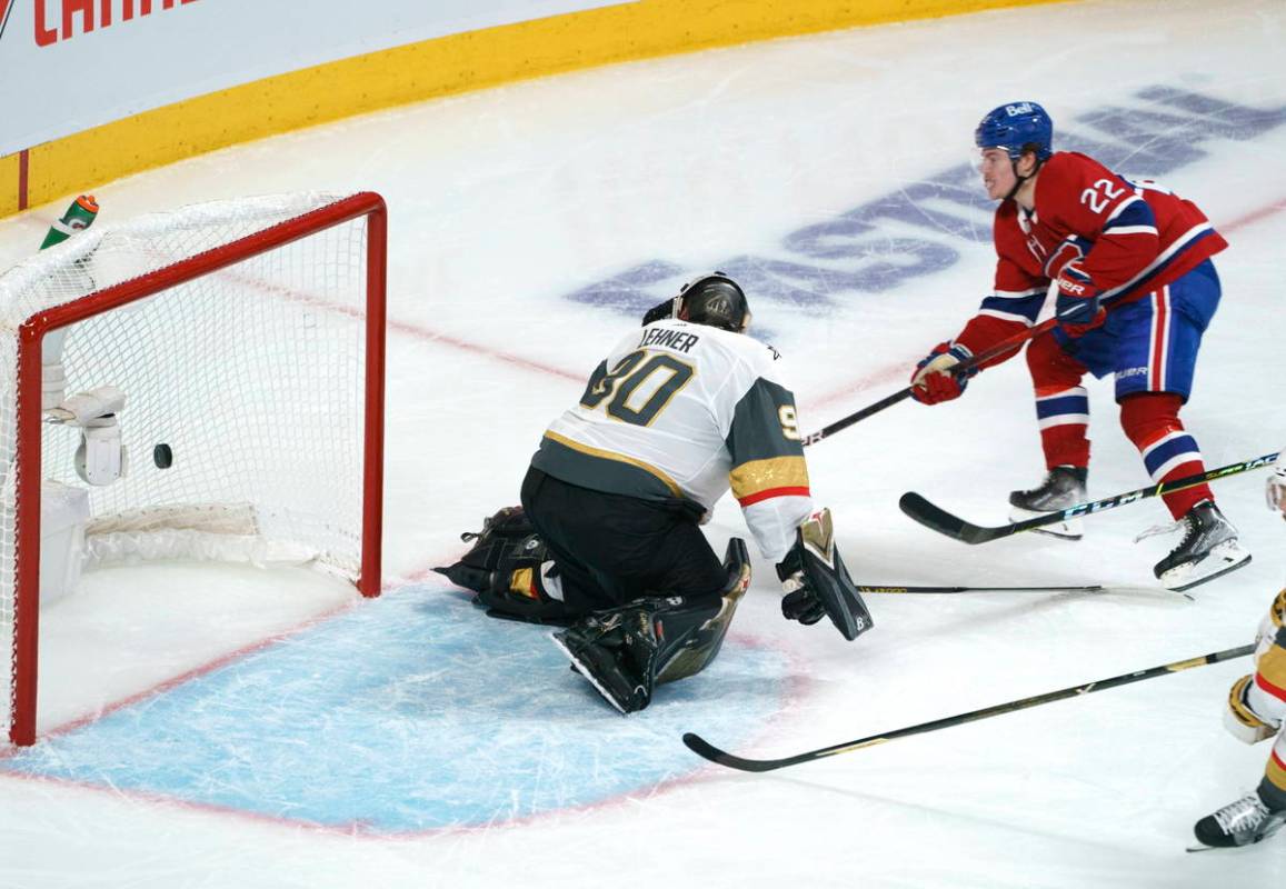 Montreal Canadiens' Cole Caufield (22) scores past Vegas Golden Knights goaltender Robin Lehner ...