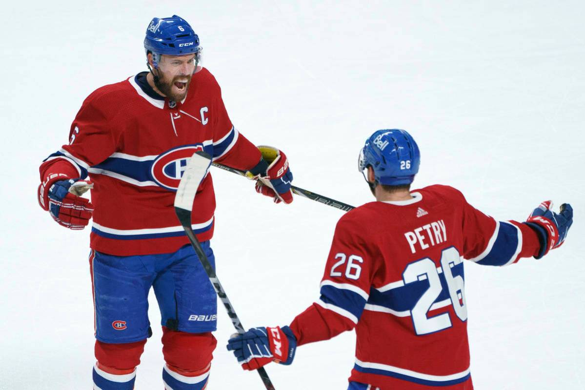 Montreal Canadiens' Shea Weber (6) celebrates his goal with teammate Jeff Petry during the firs ...