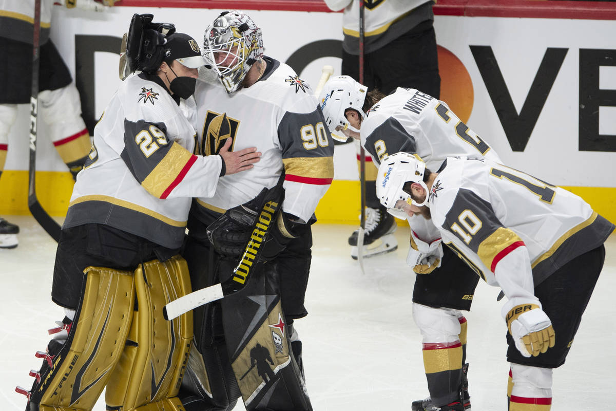 Vegas Golden Knights goaltenders Marc-Andre Fleury (29) and Robin Lehner (90) console each othe ...