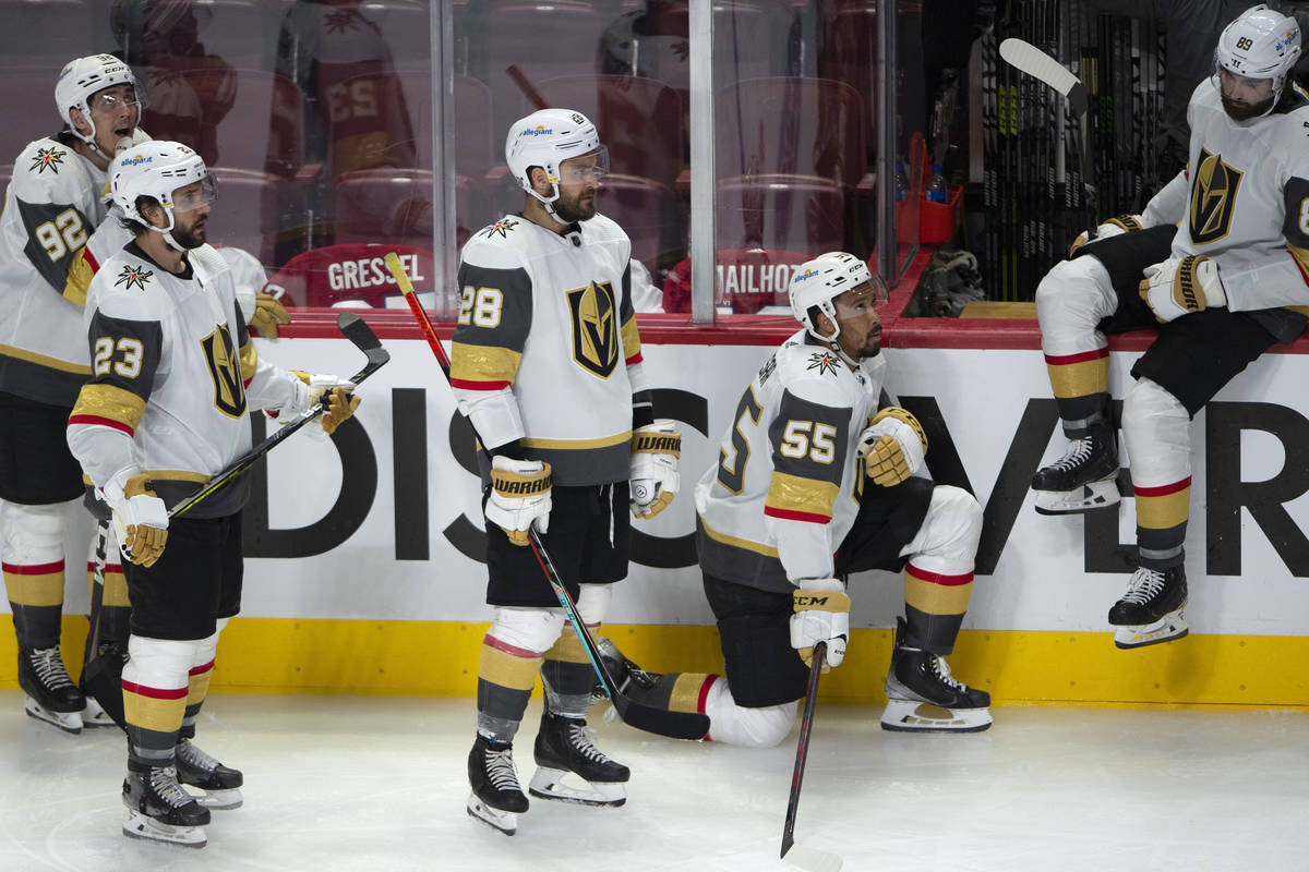 Vegas Golden Knights players watch the Montreal Canadiens celebrate following overtime in Game ...