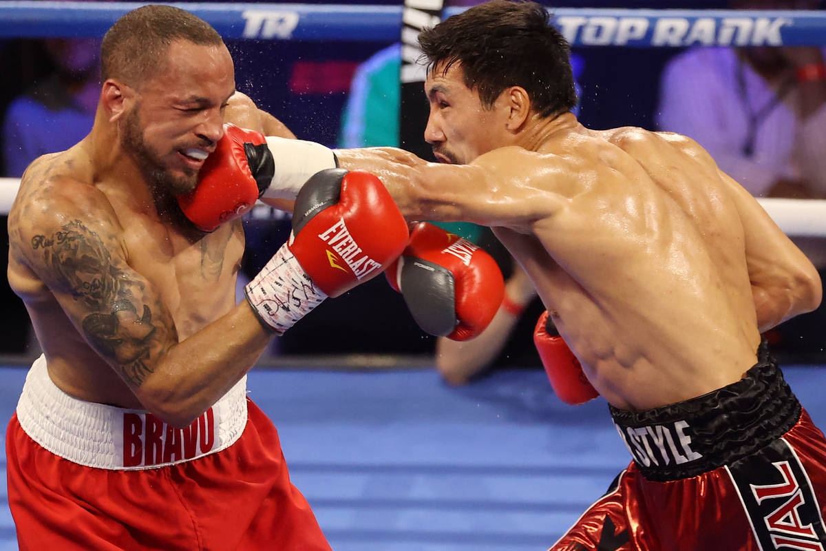 Janibek Alimkhanuly, right, connects a punch against Rob Brant, in the fourth round of the midd ...