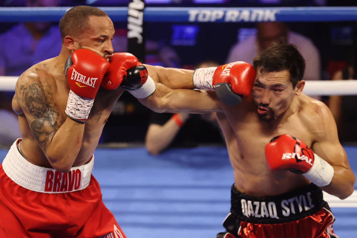 Rob Brant, left, and Janibek Alimkhanuly, battle in the second round of the middleweight bout a ...