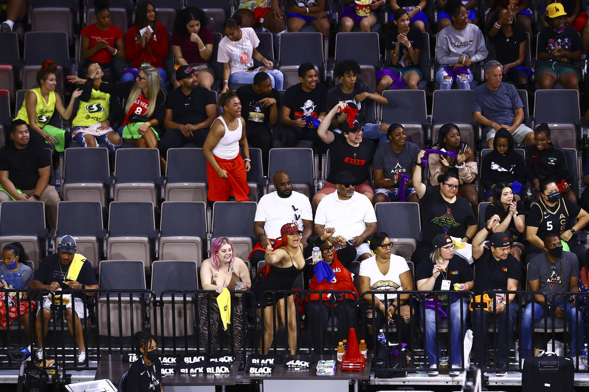 Las Vegas Aces fans cheer during a "Pride Night game" against Seattle Storm in the second quart ...