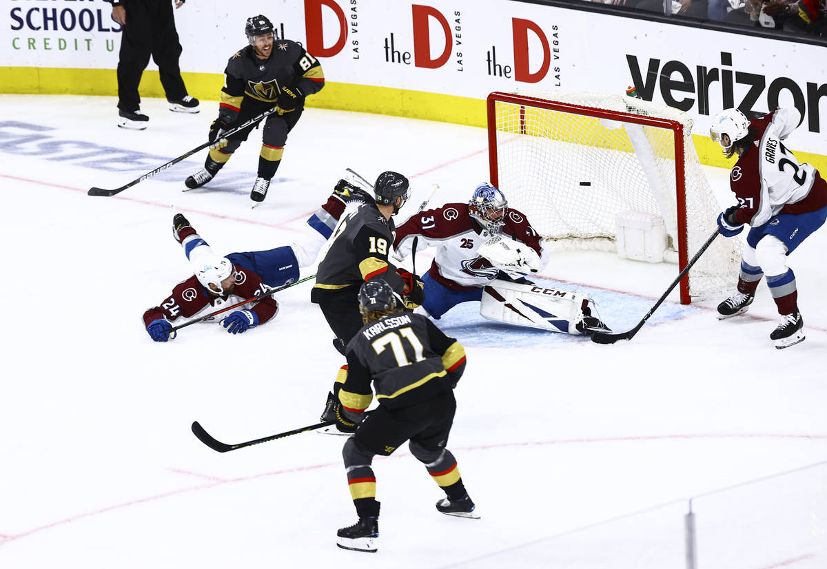 Golden Knights' Jonathan Marchessault (81) watches his shot go in against Colorado Avalanche go ...