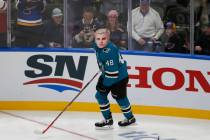 San Jose Sharks' Tomas Hertl wears a Justin Bieber mask during the Skills Competition, part of ...