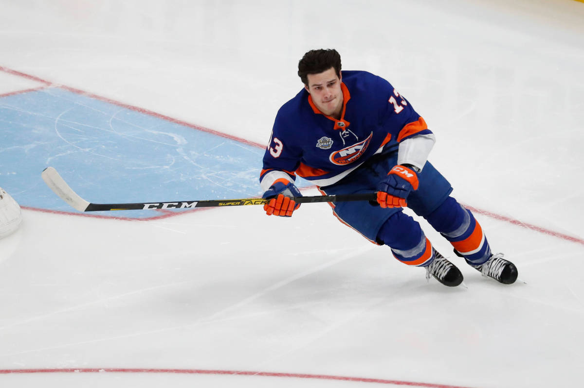 New York Islanders Matthew Barzal skates during the Skills Competition fastest skater contest, ...