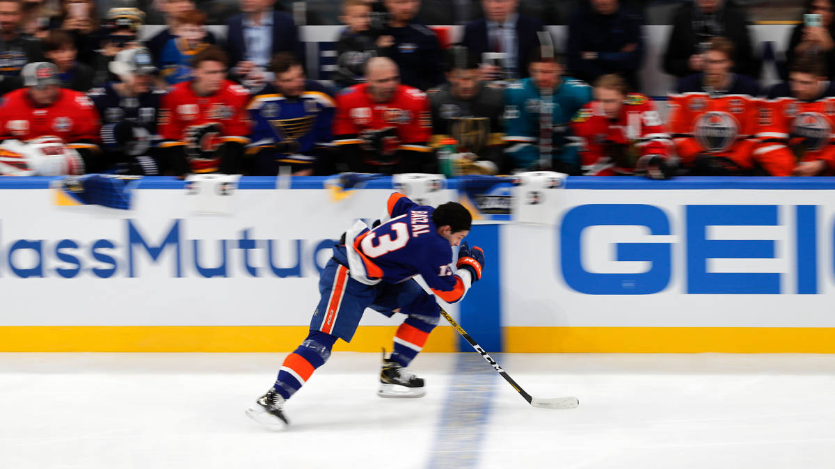 New York Islanders Matthew Barzal skates during the Skills Competition fastest skater contest, ...