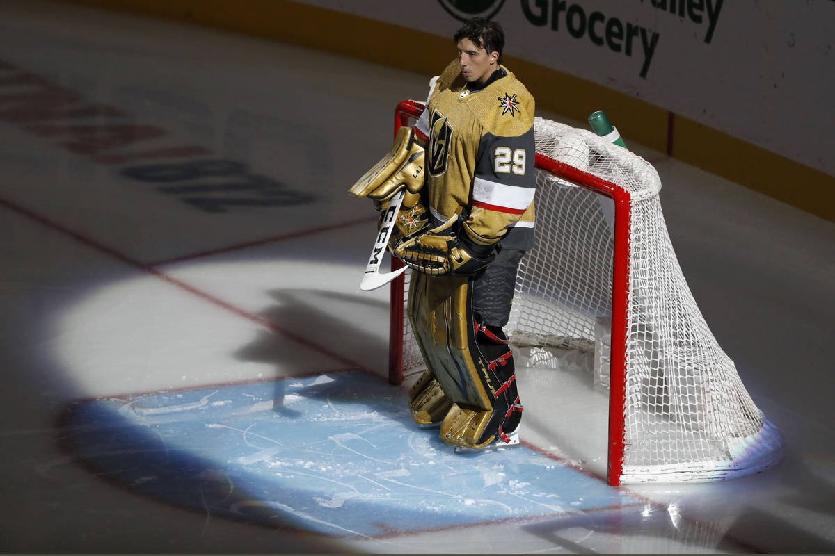 Vegas Golden Knights goaltender Marc-Andre Fleury (29) pauses during the National Anthem before ...