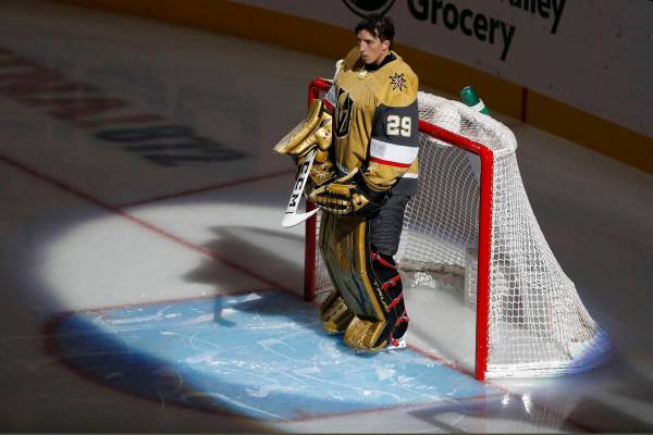 Vegas Golden Knights goaltender Marc-Andre Fleury (29) pauses during the National Anthem before ...