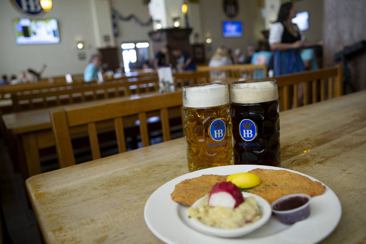 The "Schnitzel Wiener Art" and two German beers are displayed at Hofbrauhaus on Thurs ...