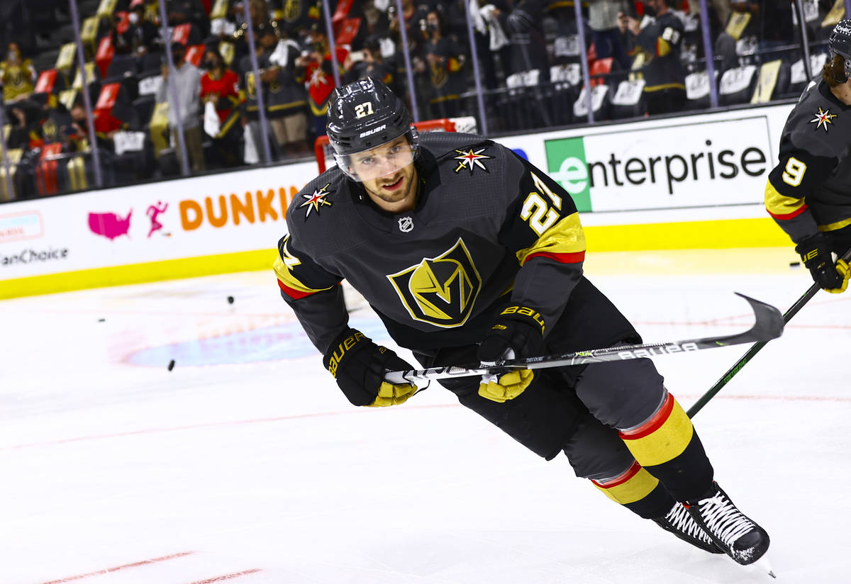 Golden Knights' Shea Theodore warms up for Game 5 of a first-round NHL hockey playoff series ag ...