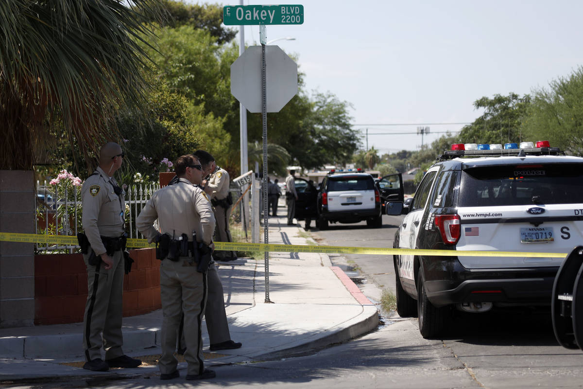 Las Vegas police investigate around Euclid Avenue near Oakey Boulevard after a man was shot and ...