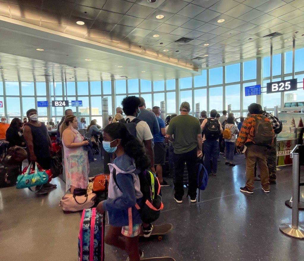 Passengers await to board Southwest Airlines Flight 606 at Gate B 25 at McCarran International ...