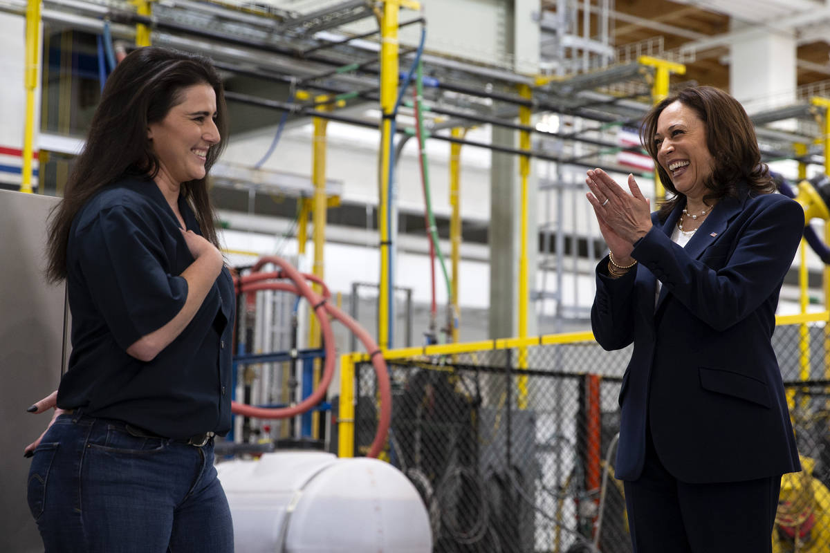 Vice President Kamala Harris, right, applauds the work of Melissa Feoranz, member of United Bro ...