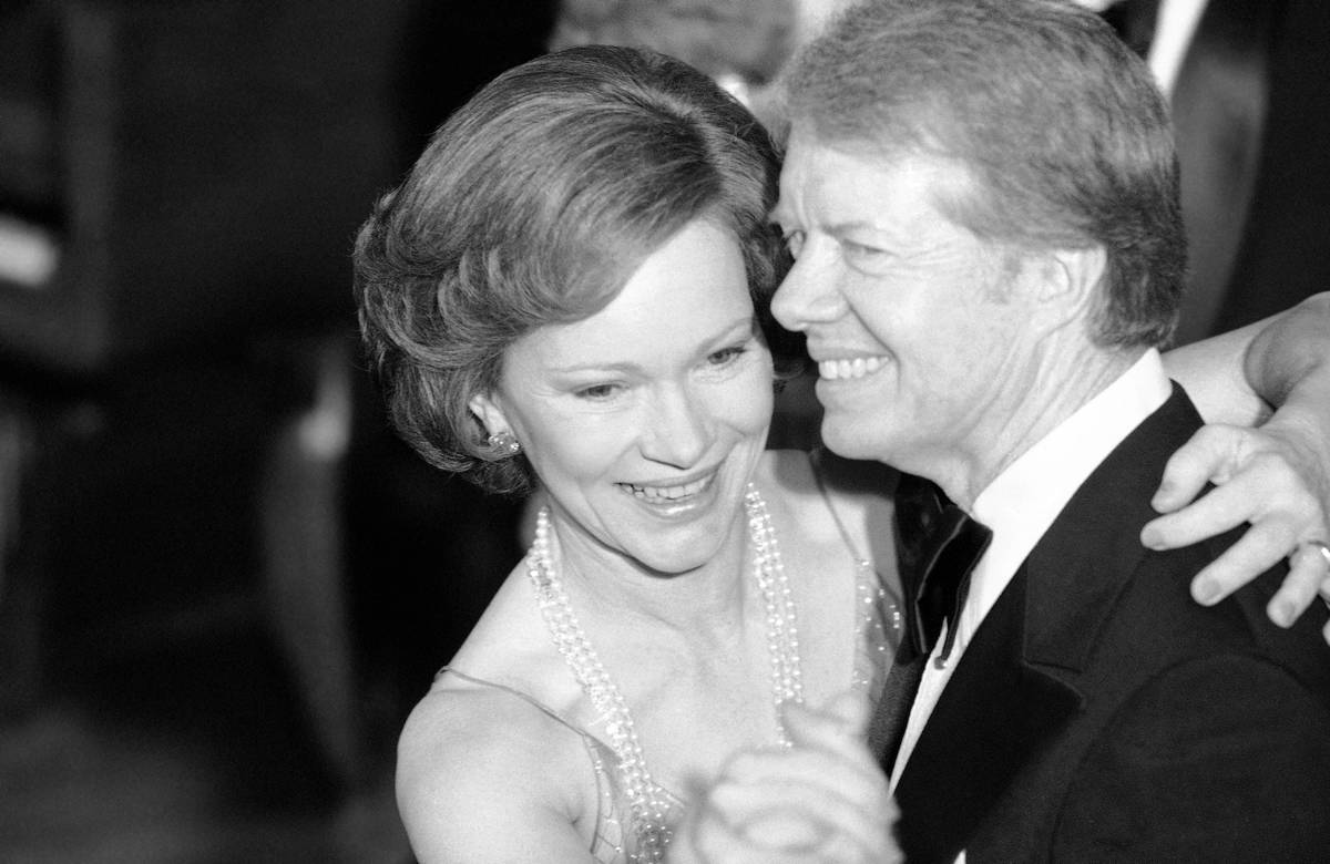 FILE - In this Dec. 13, 1978 file photo, President Jimmy Carter and his wife Rosalynn lead thei ...