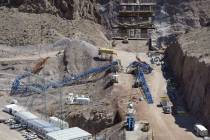 A collapsed crane tower is shown bent and twisted on the Nevada side of Black Canyon, Saturday, ...