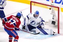 Montreal Canadiens right wing Josh Anderson (17) scores past Tampa Bay Lightning goaltender And ...