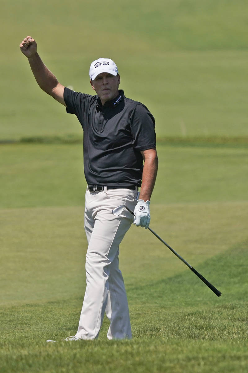 Steve Stricker reacts to an eagle on the second hole during the second round of the PGA Champio ...