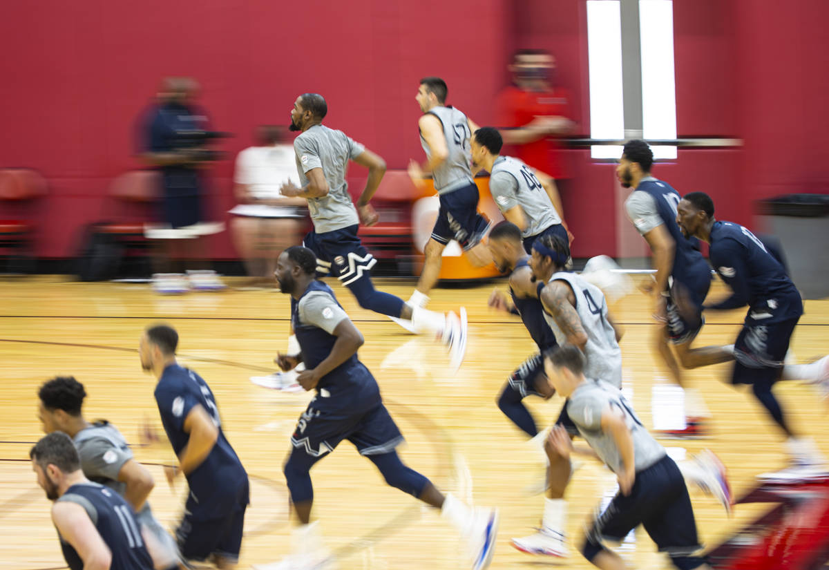 USA Basketball players train during the first day of practice, ahead of the OIympics, at Menden ...