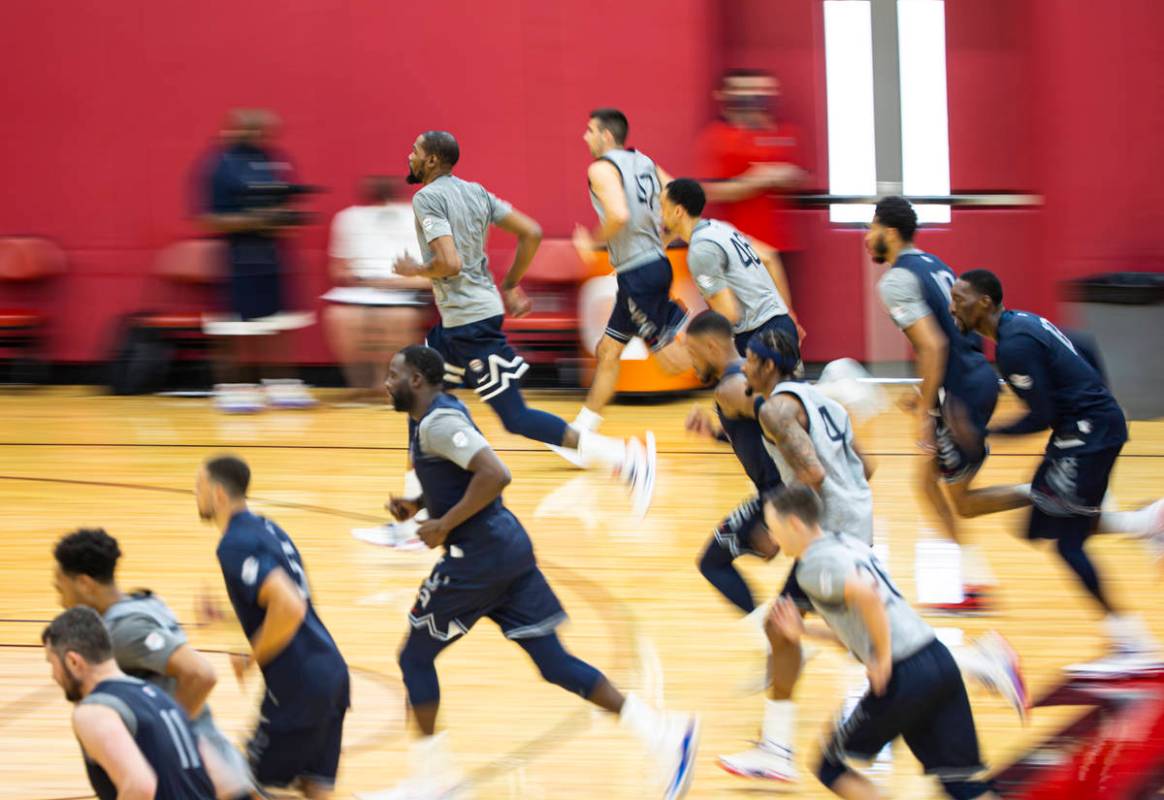 USA Basketball players train during the first day of practice, ahead of the OIympics, at Menden ...