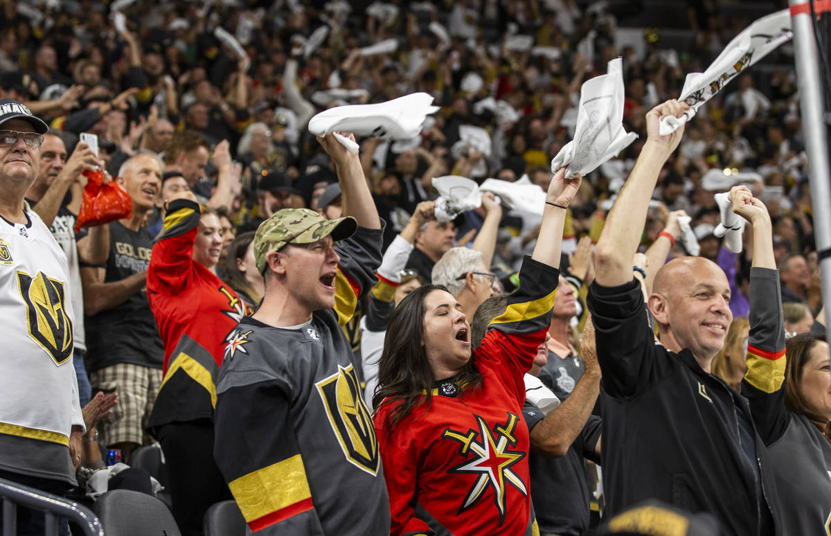 Golden Knights fans celebrate a goal by defenseman Alex Pietrangelo (7) during the third period ...