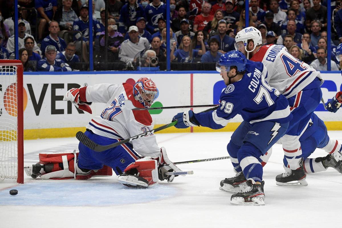 Tampa Bay Lightning left wing Ross Colton (79) scores on Montreal Canadiens goaltender Carey Pr ...