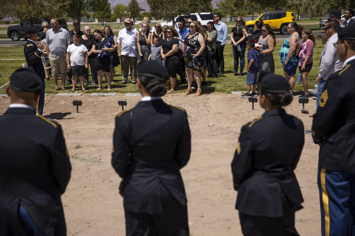 Friends and family attend the funeral service for retired Nevada National Guard member and Metr ...