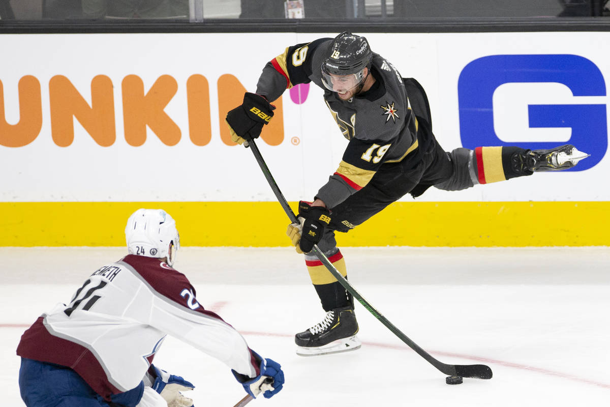 Golden Knights right wing Reilly Smith (19) makes an unsuccessful shot on goal while Avalanche ...