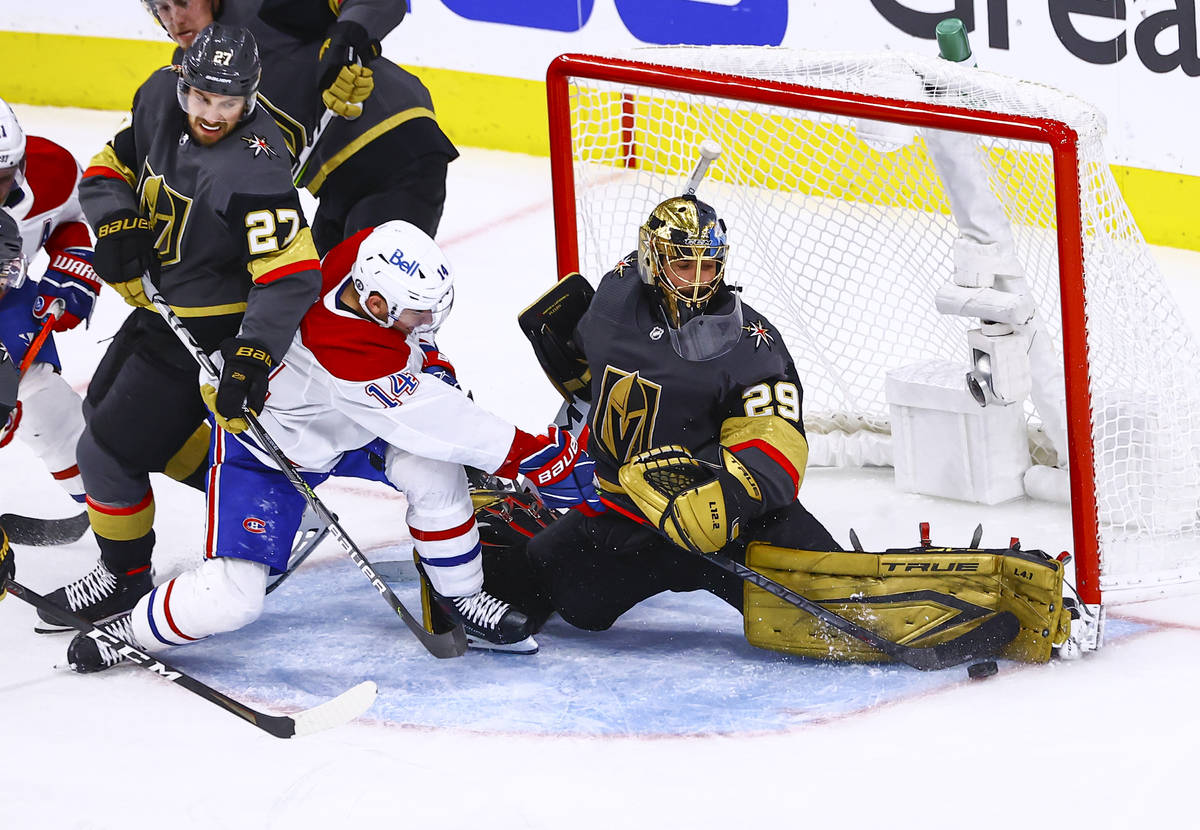 Golden Knights goaltender Marc-Andre Fleury (29) blocks an attempt by Montreal Canadiens' Nick ...