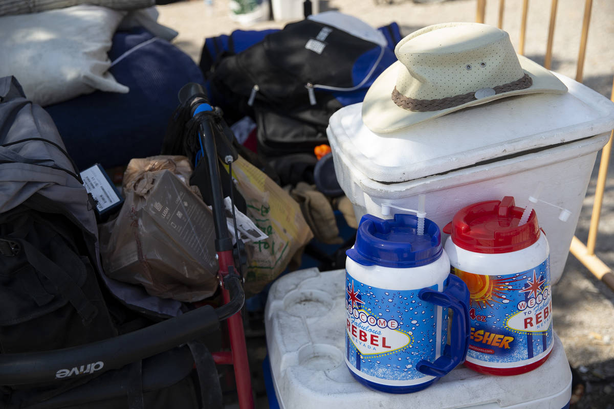 Las Vegas-themed cups are among someone's possessions at Courtyard Homeless Resource Center on ...