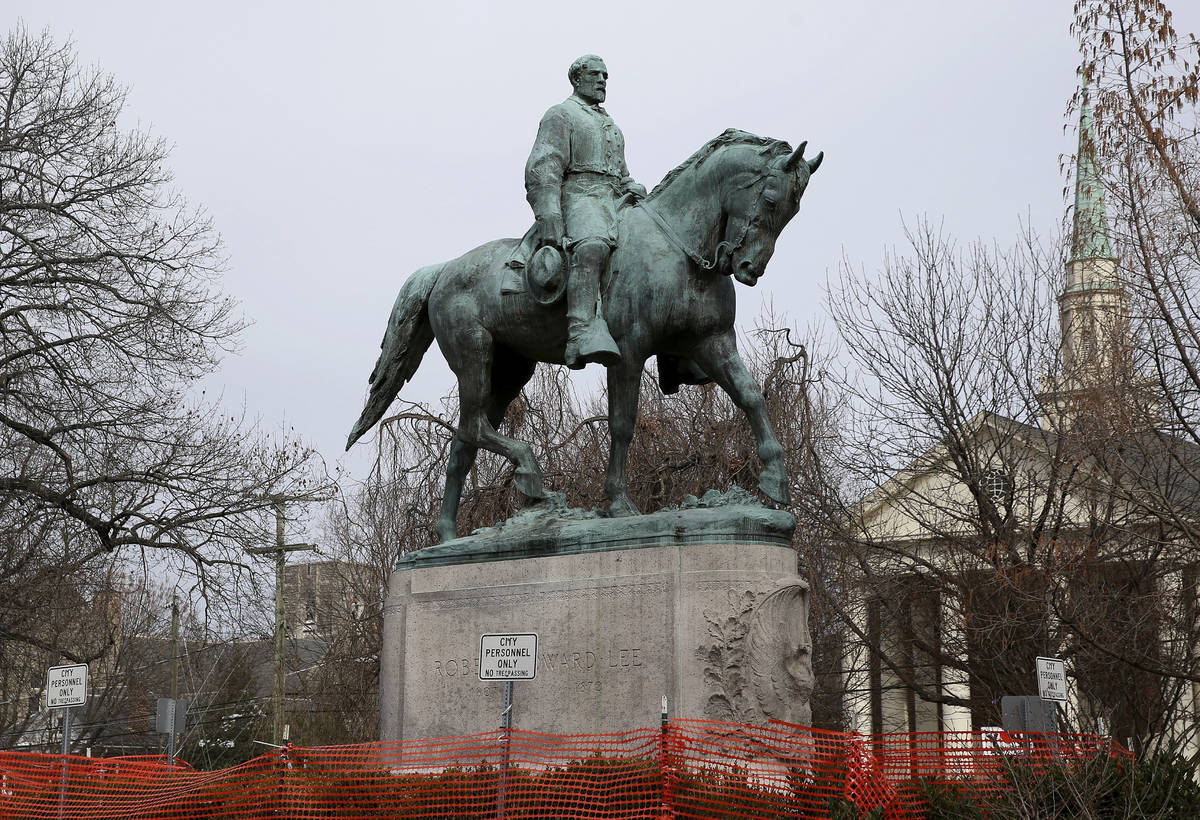 FILE - The statue of Robert E. Lee is seen uncovered in Emancipation Park in Charlottesville, V ...