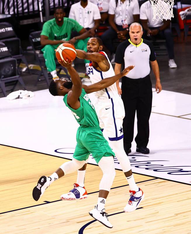 USA Basketball's Kevin Durant (7) blocks a shot from Nigeria’s Ike Nwamu (34) during the ...