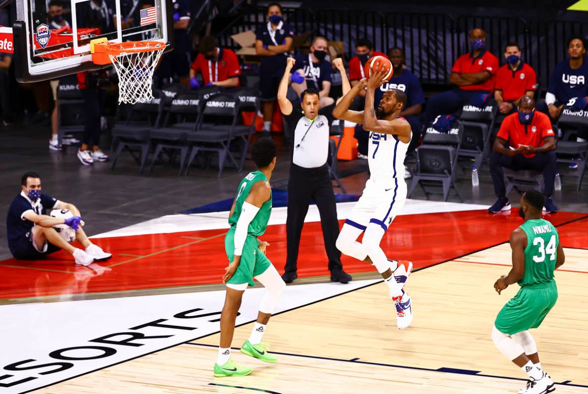 USA Basketball's Kevin Durant (7) shoots over Nigeria’s KZ Okpala (0) during the first h ...