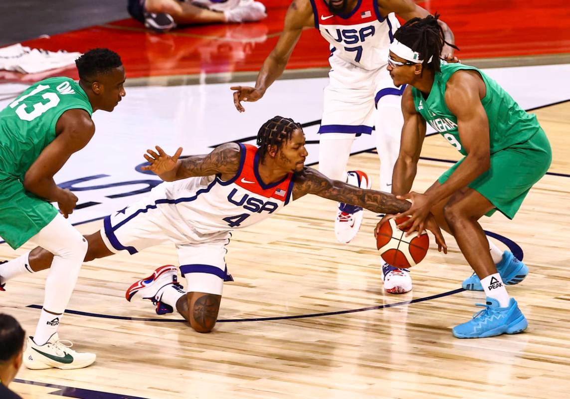 USA Basketball's Bradley Beal (4) battles for the ball against Nigeria’s Chima Moneke (9 ...