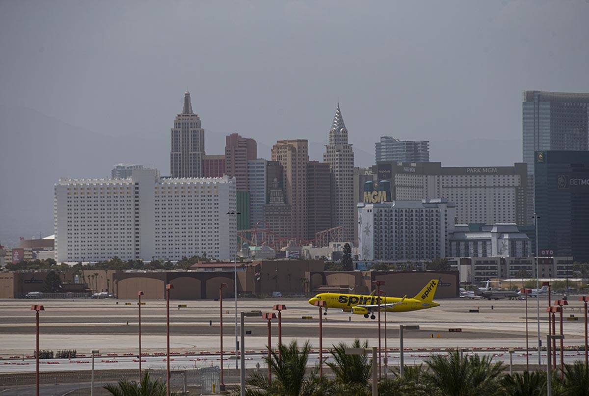 A Spirit Airlines plane takes lands at McCarran International Airport as hazy weather condition ...