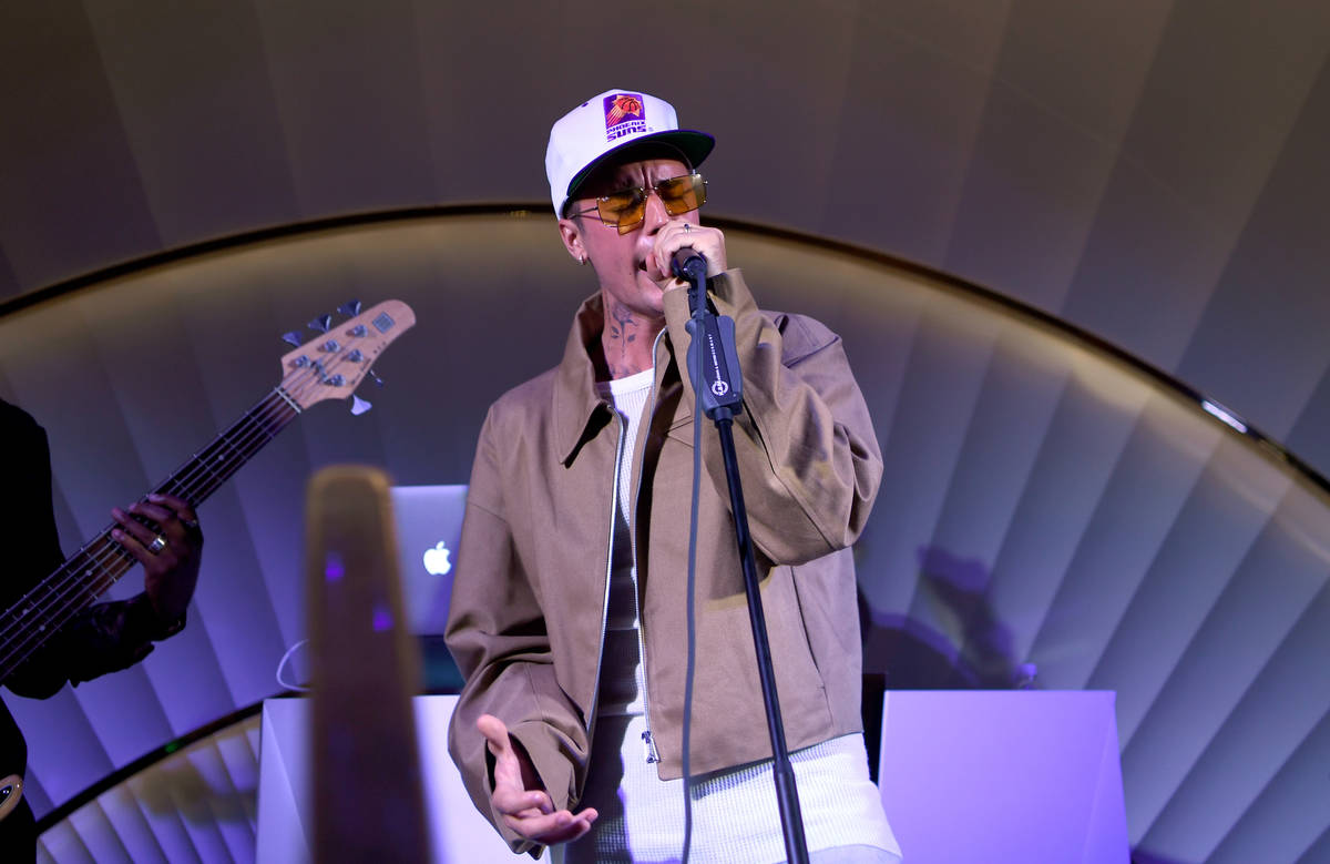 Justin Bieber performs onstage at h.wood Group's grand opening of Delilah at Wynn Las Vegas on ...