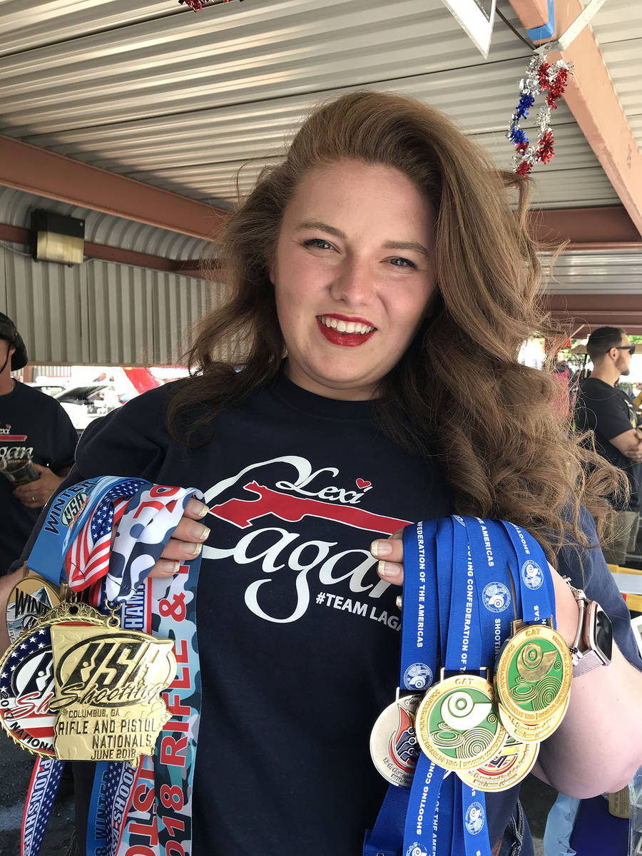 Alexis Lagan of Boulder City shows off the medals she has won competing in shooting events. She ...