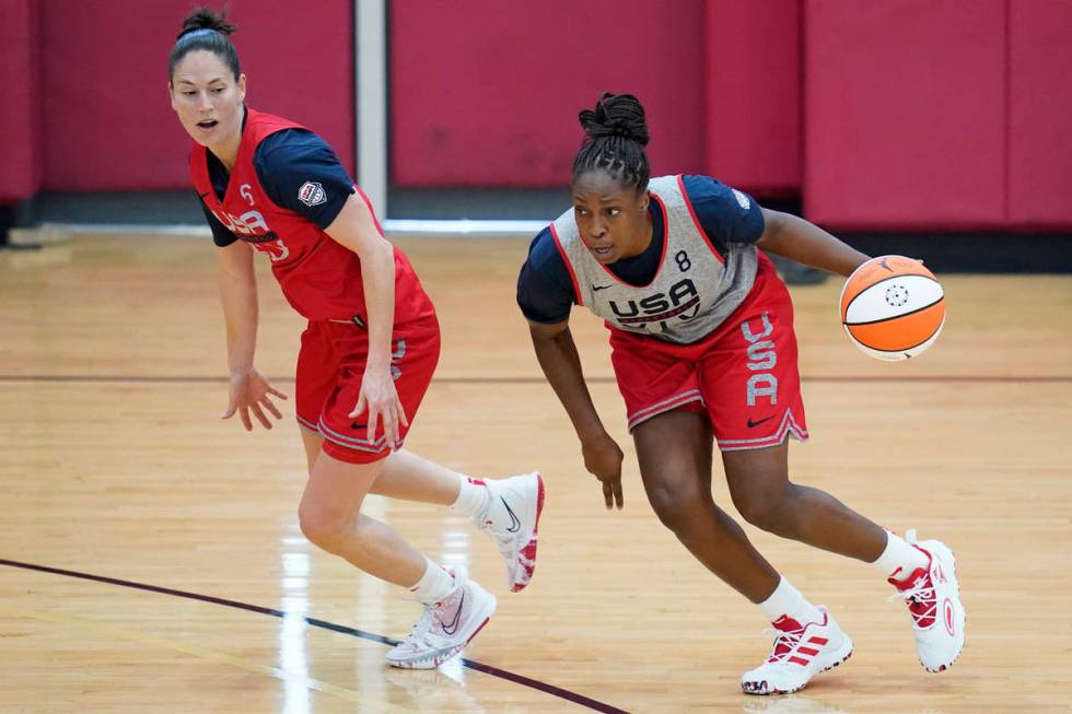 Chelsea Gray drives around Sue Bird during practice for the U.S women's basketball team in prep ...