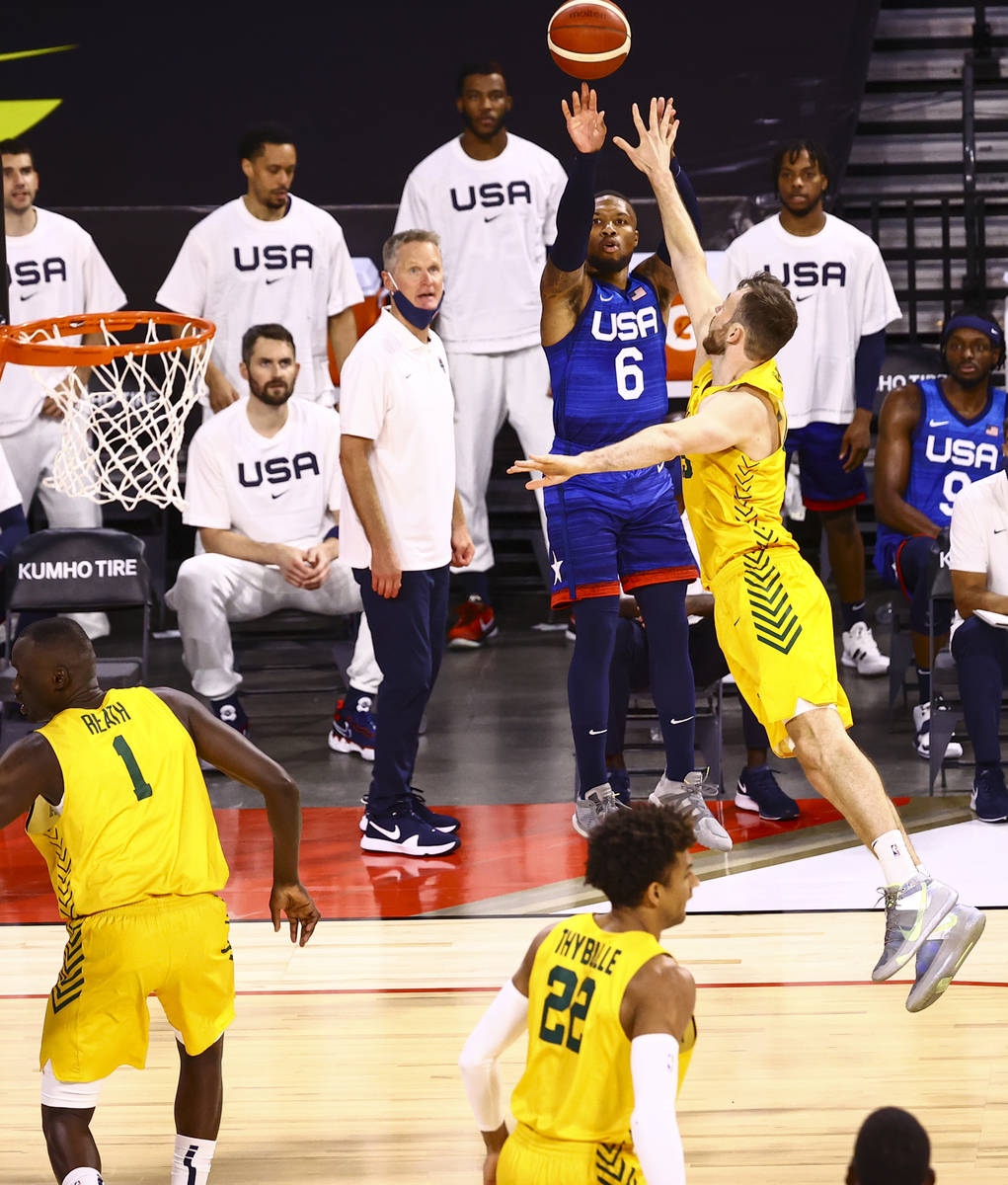 USA’s Damian Lillard (6) shoots as Australia's Nick Kay (15) defends during the first ha ...