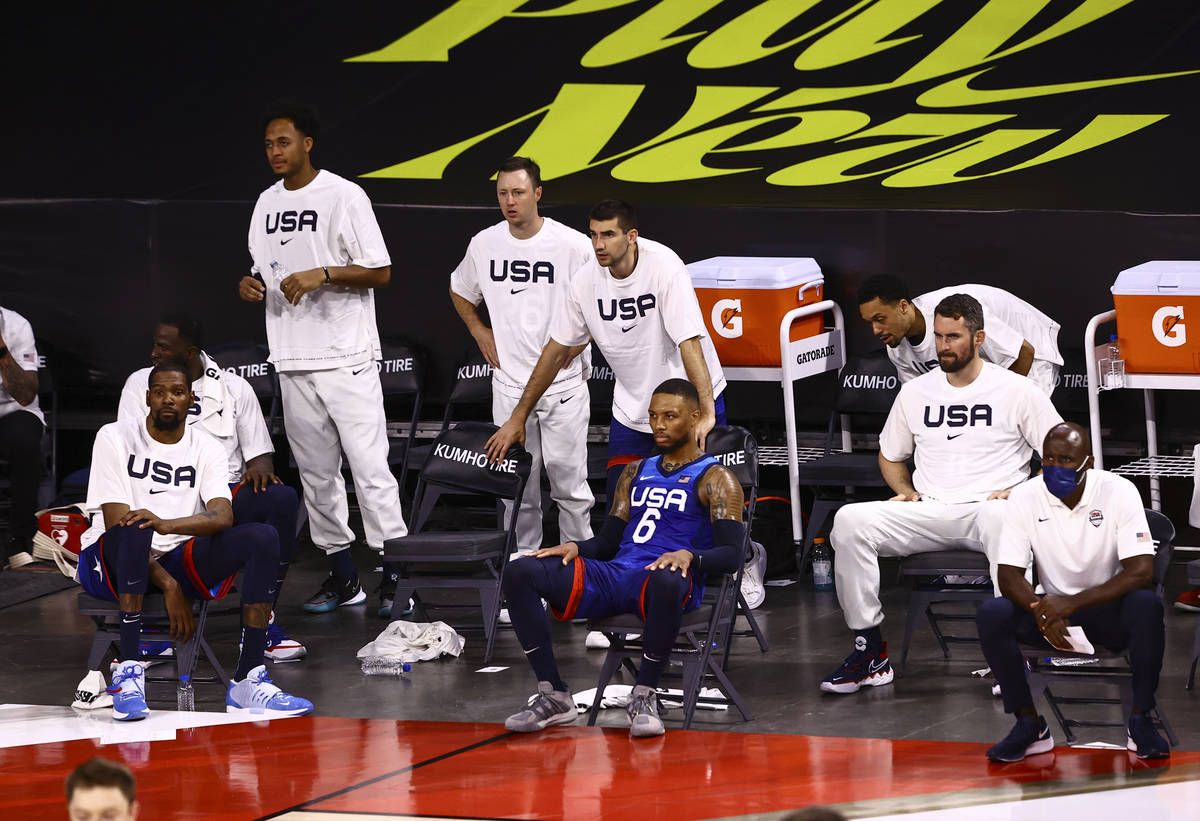 Members of USA Basketball react as they trail Australia during the second half of an exhibition ...