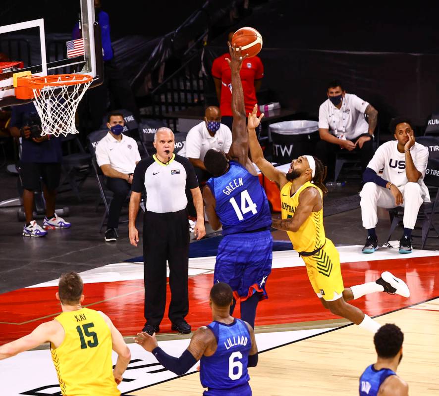 USAճ Draymond Green (14) blocks a shot from Australia's Patty Mills (5) during the second ...