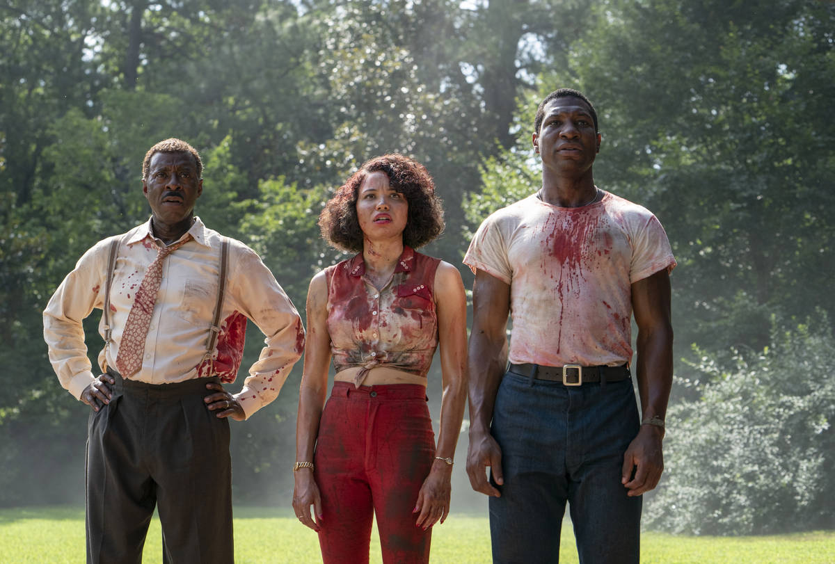 This image released by HBO shows, from left, Courtney B. Vance, Jurnee Smollett and Jonathan Ma ...