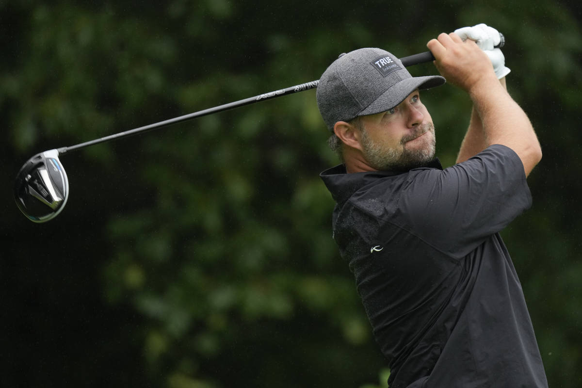 Ryan Moore hits off the second tee during the final round of the John Deere Classic golf tourna ...
