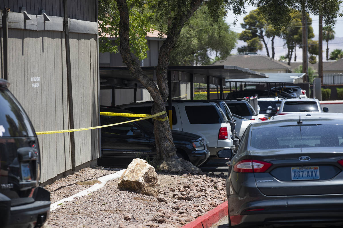 The scene of a homicide investigation in the 1700 block of Karen Avenue in central Las Vegas Tu ...