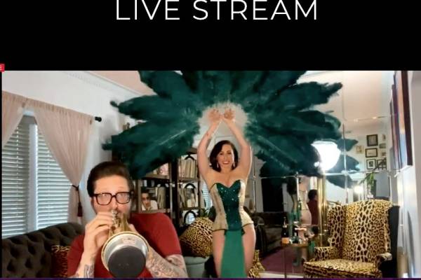 Brian Newman and his wife, Angie Pontani, are shown during the Mondays Dark Live Stream Teletho ...