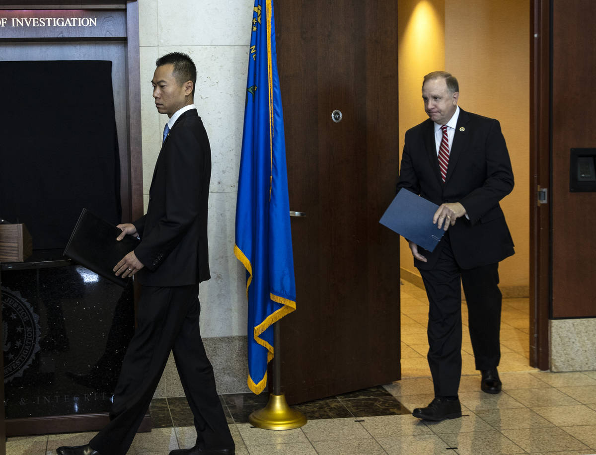 Acting U.S. Attorney Christopher Chiou, left, and Special Agent in Charge Aaron Rouse of the FB ...