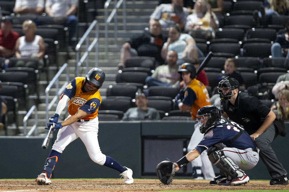 Aviators infielder Vimael Machin swings against the Reno Aces during a minor league baseball ga ...