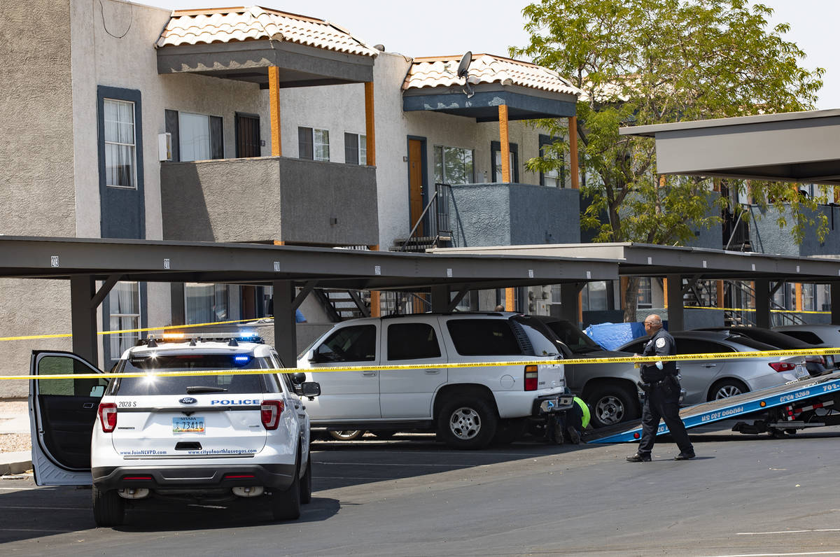 Police at the scene of a homicide on the 1000 block of East Carey Avenue in North Las Vegas Wed ...