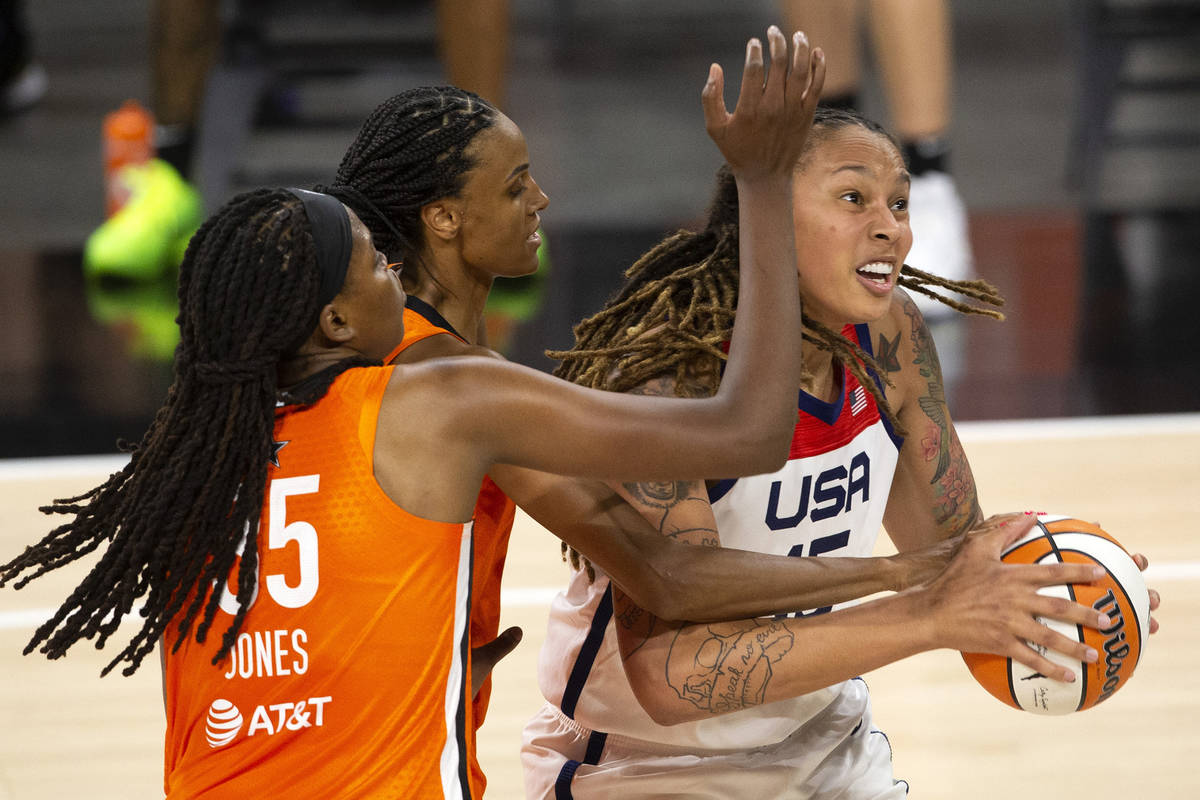 Team WNBA's Jonquel Jones (35) and DeWanna Bonner, center, guard U.S. Women's National Team's B ...