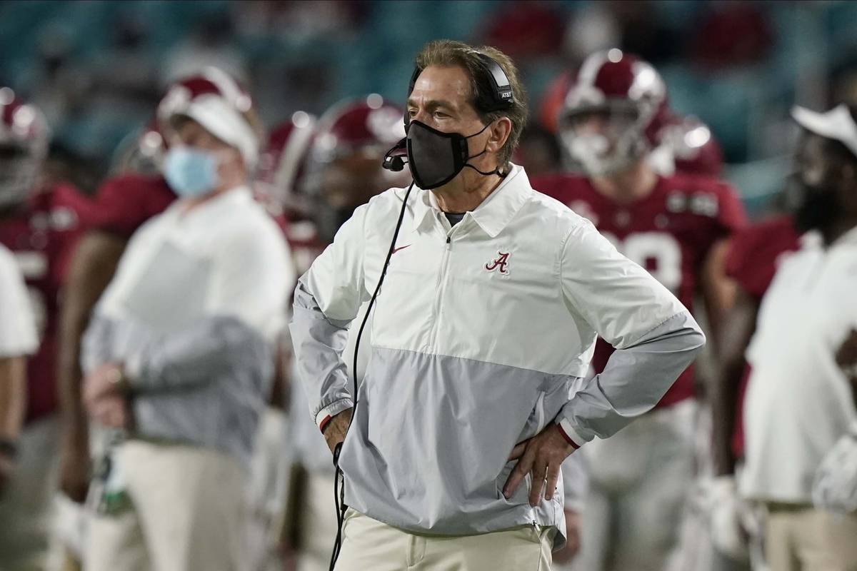 Alabama coach Nick Saban watches his team during the first half of an NCAA College Football Pla ...